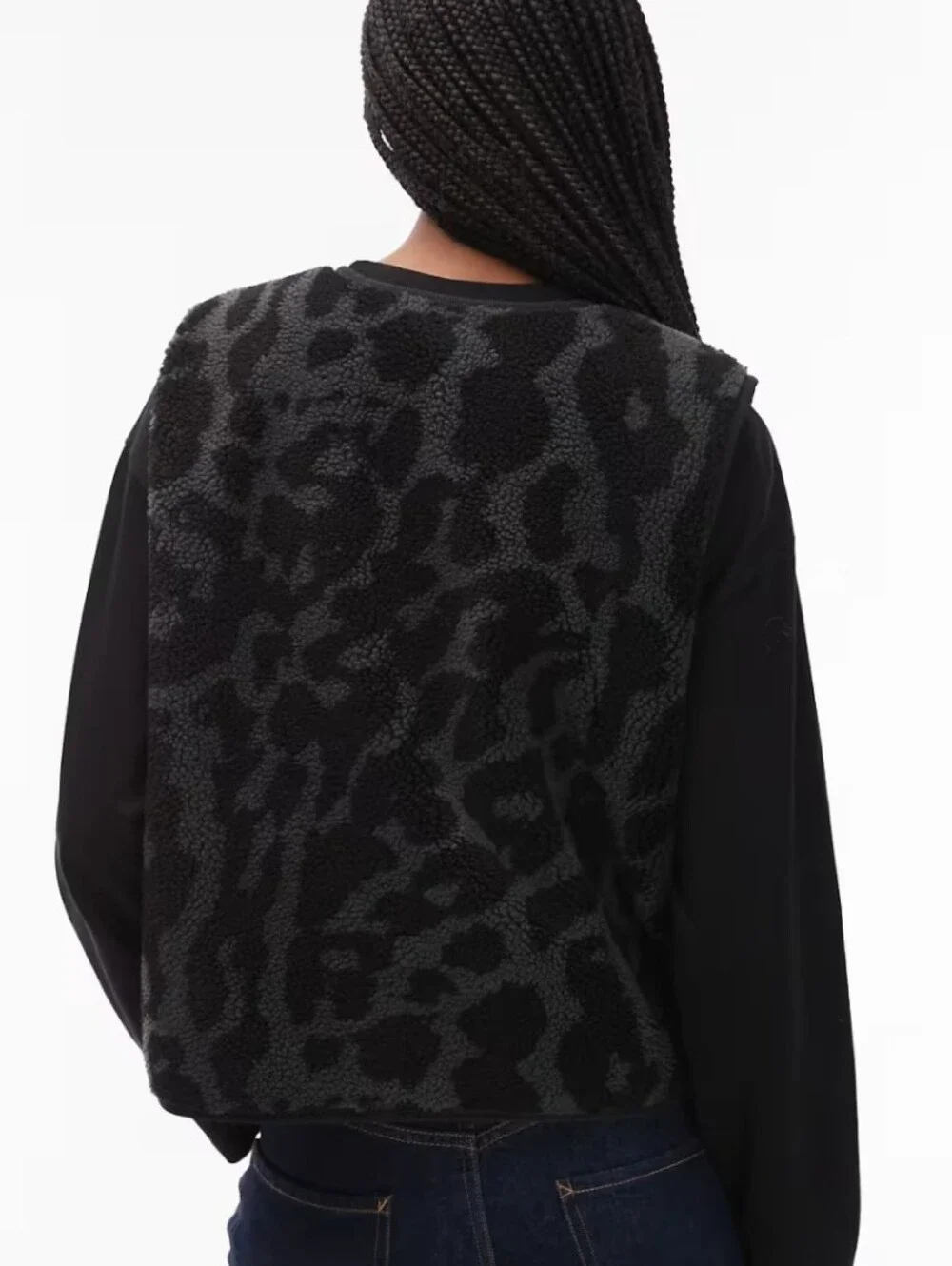 Nike Street reversible sherpa vest in black and leopard print